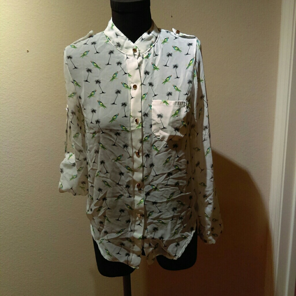Sheer top with bird and palm tree pattern